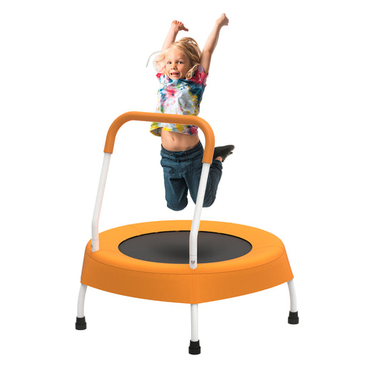 A little girl is jumping on a MyFunGear orange mini trampoline with a handlebar